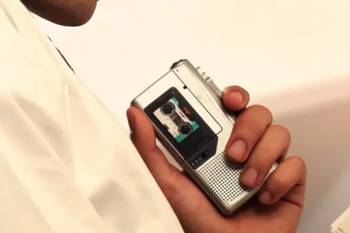 Picture Of A Man Using A Cassette Recorder